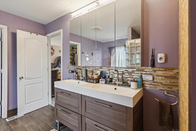 229 Stone Hollow Dr, Poplar Grove, IL 61065 - full bath featuring backsplash, double vanity, a spacious closet, and a sink