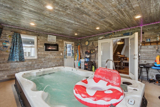 229 Stone Hollow Dr, Poplar Grove, IL 61065 - miscellaneous room featuring wooden ceiling, finished concrete flooring, and stairway