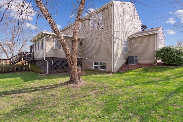 229 Stone Hollow Dr, Poplar Grove, IL 61065 - back of property with central air condition unit, a wooden deck, stairway, and a lawn