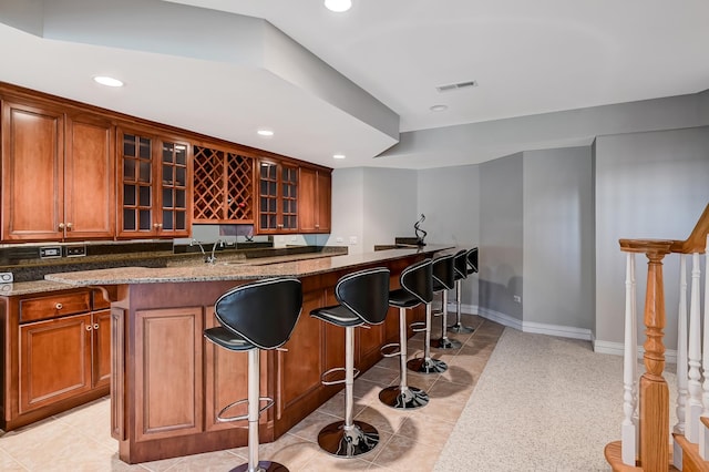 909 Prairie Ridge Ct, Burr Ridge, IL 60527 - indoor wet bar with light tile patterned flooring, recessed lighting, and baseboards