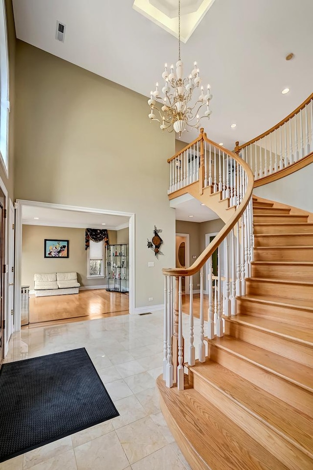 909 Prairie Ridge Ct, Burr Ridge, IL 60527 - staircase featuring a high ceiling, a chandelier, baseboards, and recessed lighting