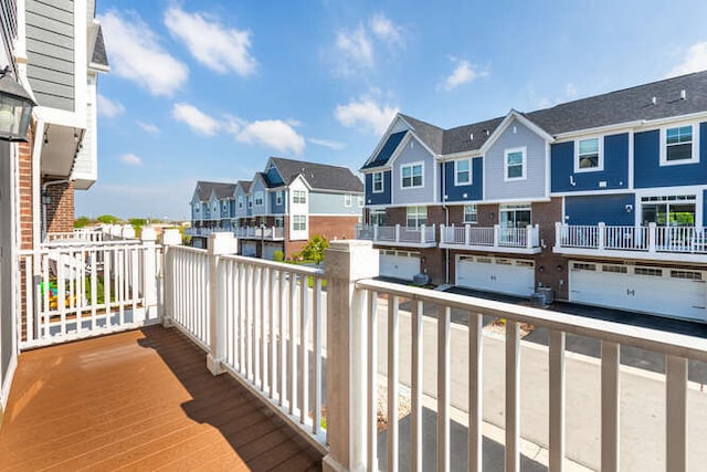 balcony featuring a residential view