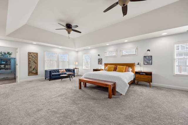 bedroom with baseboards, recessed lighting, multiple windows, and carpet flooring