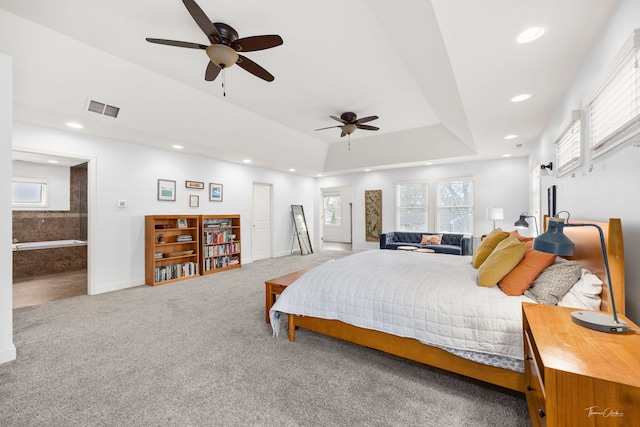 carpeted bedroom featuring baseboards, visible vents, a ceiling fan, and recessed lighting