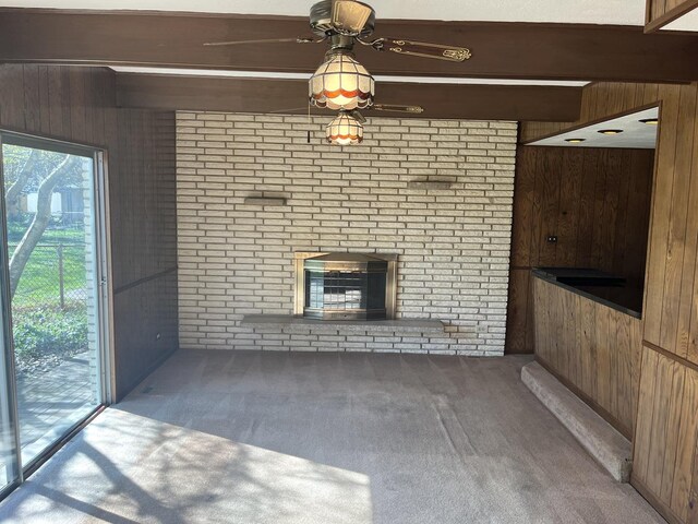 9609 S Kenneth Ave, Oak Lawn, IL 60453 - unfurnished living room with carpet, beam ceiling, and wooden walls