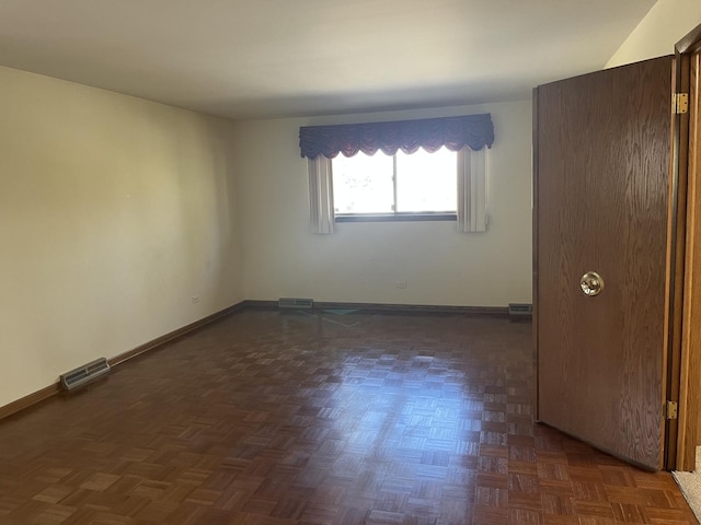 9609 S Kenneth Ave, Oak Lawn, IL 60453 - spare room with baseboards and visible vents
