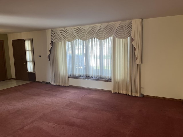 9609 S Kenneth Ave, Oak Lawn, IL 60453 - carpeted empty room featuring baseboards