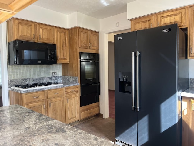 9609 S Kenneth Ave, Oak Lawn, IL 60453 - kitchen with a warming drawer, backsplash, black appliances, and brown cabinetry