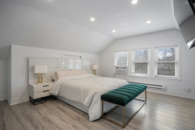 bedroom with baseboards, recessed lighting, light wood-style floors, lofted ceiling, and a baseboard radiator