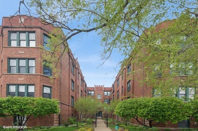 3128 W Carmen Ave Unit 2, Chicago, IL 60625 - view of property with fence