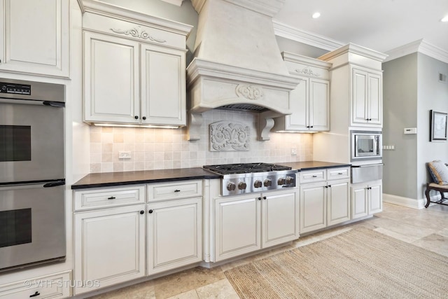 kitchen with crown molding, dark countertops, appliances with stainless steel finishes, and custom exhaust hood