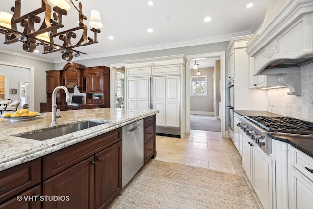 kitchen featuring a sink, decorative backsplash, stainless steel appliances, custom range hood, and recessed lighting