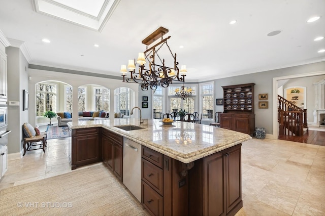 kitchen featuring dishwasher, an inviting chandelier, crown molding, and a sink