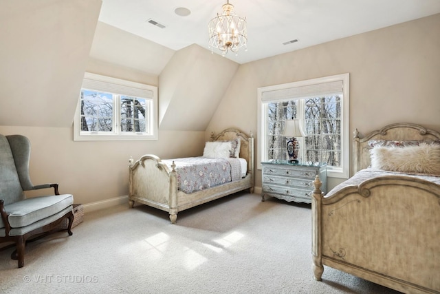 bedroom with a chandelier, vaulted ceiling, visible vents, and light carpet