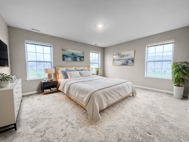 8506 Stillwater Rd, Wonder Lake, IL 60097 - kitchen with appliances with stainless steel finishes, a sink, light wood-style floors, light countertops, and a kitchen island