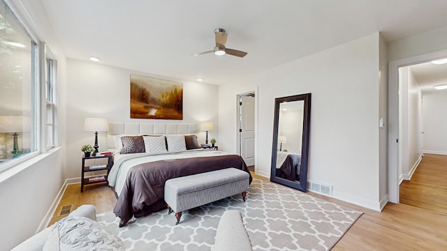 7350 N Karlov Ave, Lincolnwood, IL 60712 - bedroom with light wood-style floors and a ceiling fan