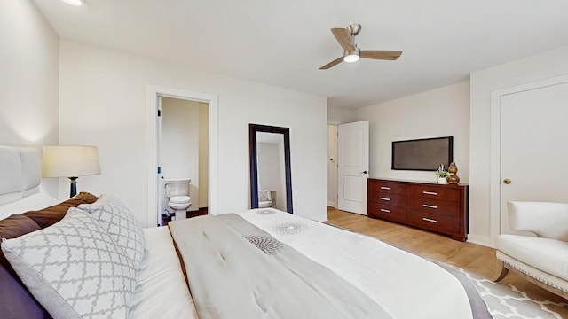 7350 N Karlov Ave, Lincolnwood, IL 60712 - bedroom featuring light wood-style flooring, ensuite bathroom, and a ceiling fan