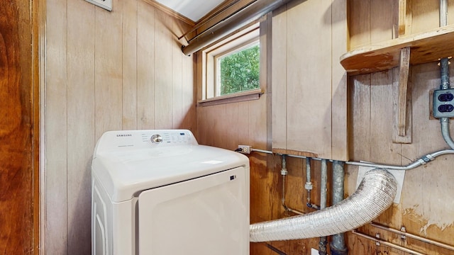 7350 N Karlov Ave, Lincolnwood, IL 60712 - laundry room with washer / dryer and wood walls