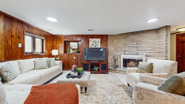 7350 N Karlov Ave, Lincolnwood, IL 60712 - living area with wood walls and a stone fireplace