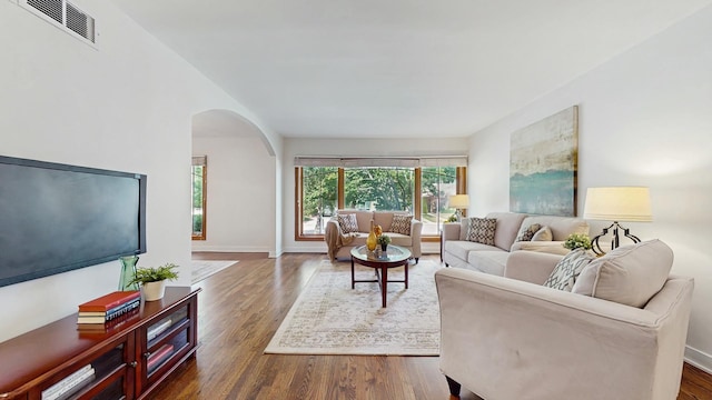 7350 N Karlov Ave, Lincolnwood, IL 60712 - living area with arched walkways and wood finished floors