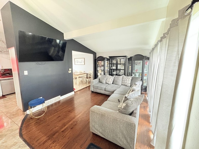 16117 Wabash Ave, South Holland, IL 60473 - living area featuring visible vents, vaulted ceiling with beams, and wood finished floors