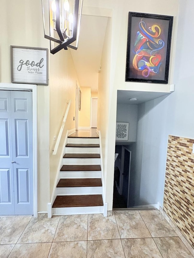 16117 Wabash Ave, South Holland, IL 60473 - stairs featuring baseboards and an inviting chandelier