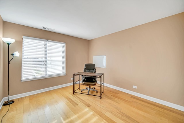 2201 S Grace St Unit 608, Lombard, IL 60148 - home office with baseboards, visible vents, and wood finished floors
