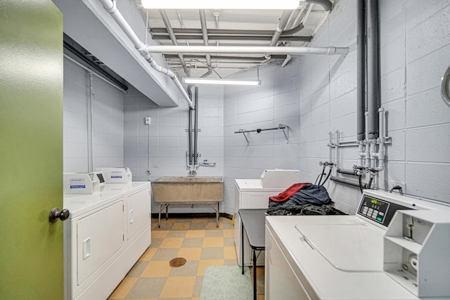 2201 S Grace St Unit 608, Lombard, IL 60148 - shared laundry area with washer and dryer and light floors