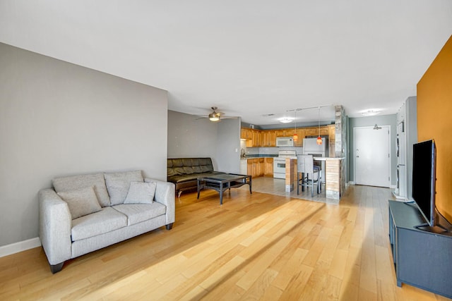 2201 S Grace St Unit 608, Lombard, IL 60148 - living room with baseboards, light wood finished floors, and ceiling fan
