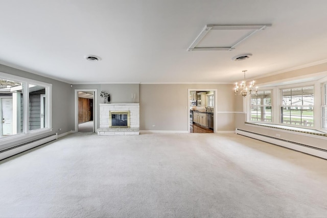 unfurnished living room featuring a baseboard heating unit, visible vents, a notable chandelier, a fireplace, and ornamental molding