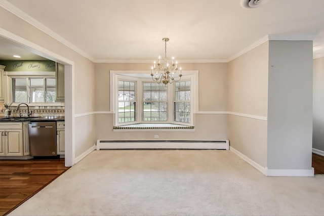 unfurnished dining area with a baseboard heating unit, a wealth of natural light, a sink, and a notable chandelier