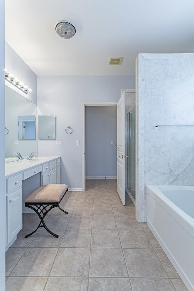 full bathroom with tile patterned floors, visible vents, vanity, a garden tub, and a stall shower
