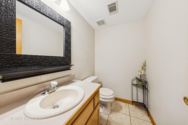 half bath featuring visible vents, tile patterned floors, toilet, and vanity