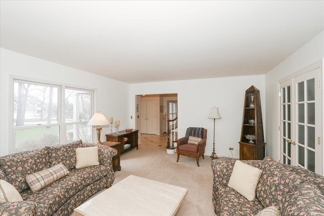 living room featuring light colored carpet