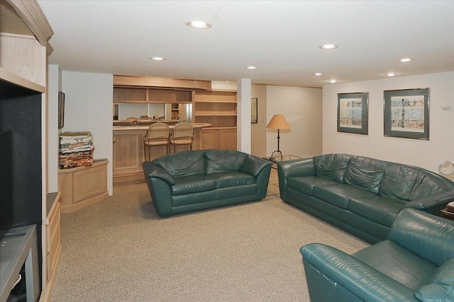 carpeted living room featuring recessed lighting