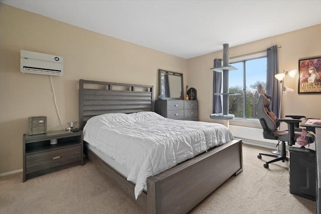 carpeted bedroom with a wall mounted air conditioner and baseboards