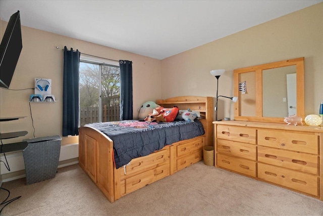 bedroom with light colored carpet