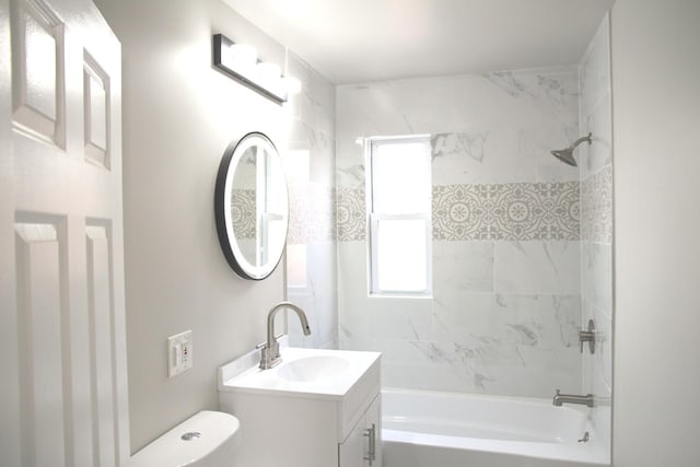 full bath featuring shower / bathing tub combination, toilet, and vanity
