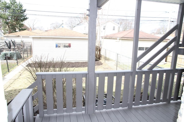 deck with a fenced backyard