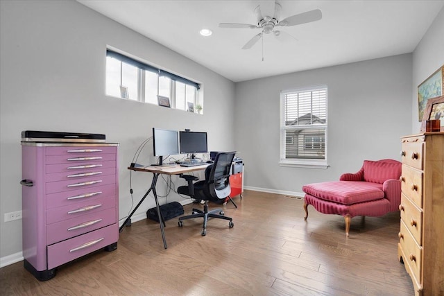 office with baseboards, recessed lighting, wood finished floors, and a ceiling fan