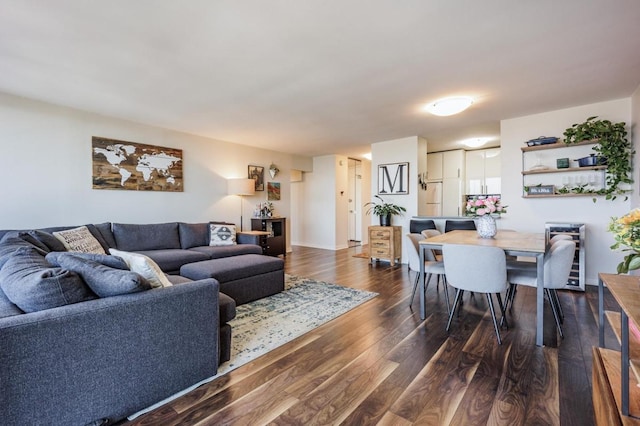 living area featuring dark wood-type flooring