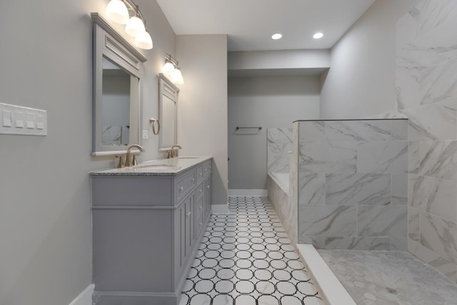 840 S Cuyler Ave, Oak Park, IL 60304 - full bathroom with a tile shower, baseboards, a sink, and double vanity