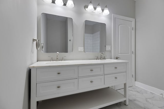 840 S Cuyler Ave, Oak Park, IL 60304 - full bathroom featuring baseboards, marble finish floor, a sink, and double vanity
