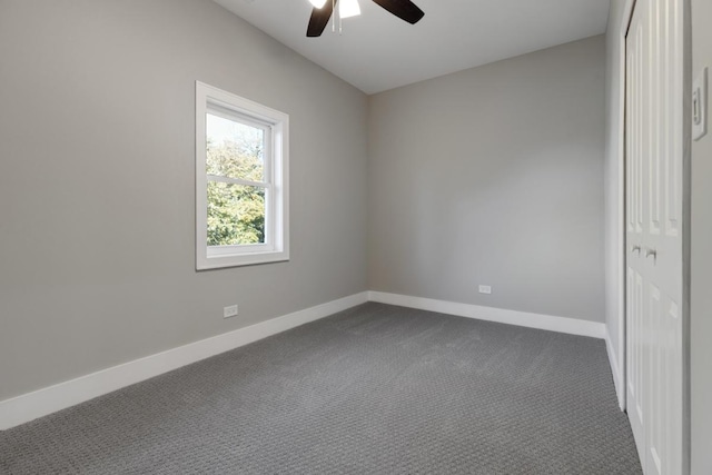 840 S Cuyler Ave, Oak Park, IL 60304 - unfurnished bedroom with a closet, a ceiling fan, dark carpet, and baseboards