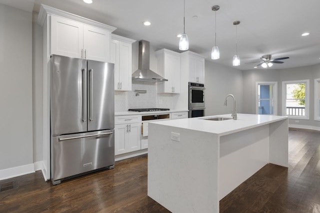 840 S Cuyler Ave, Oak Park, IL 60304 - kitchen featuring a sink, dark wood-style flooring, tasteful backsplash, wall chimney range hood, and appliances with stainless steel finishes
