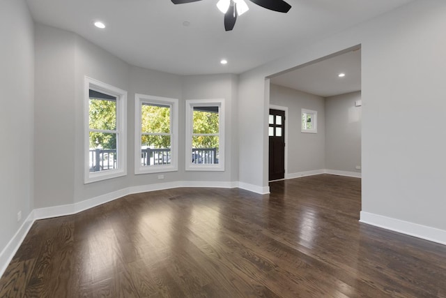 840 S Cuyler Ave, Oak Park, IL 60304 - unfurnished living room with ceiling fan, baseboards, wood finished floors, and plenty of natural light