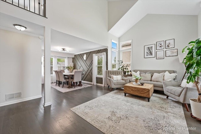 1682 Brompton Ln, Crystal Lake, IL 60014 - living room featuring high vaulted ceiling, baseboards, wood finished floors, and visible vents
