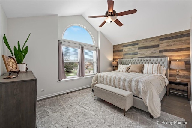 1682 Brompton Ln, Crystal Lake, IL 60014 - bedroom with high vaulted ceiling, multiple windows, wood walls, and an accent wall