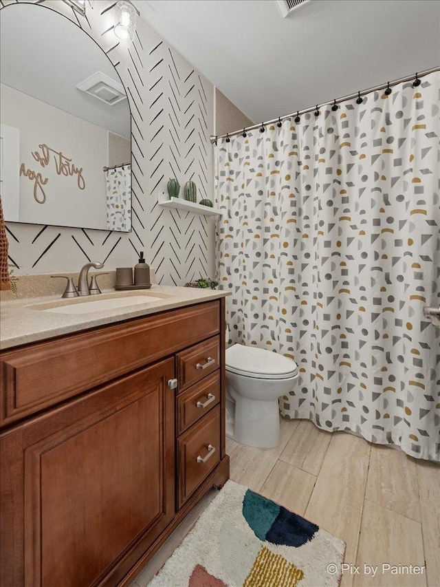 1682 Brompton Ln, Crystal Lake, IL 60014 - bathroom featuring toilet, a shower with curtain, and vanity