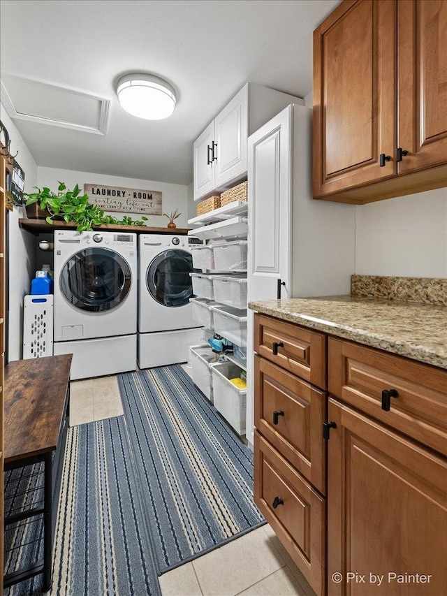 1682 Brompton Ln, Crystal Lake, IL 60014 - washroom with attic access, washing machine and dryer, tile patterned flooring, and cabinet space
